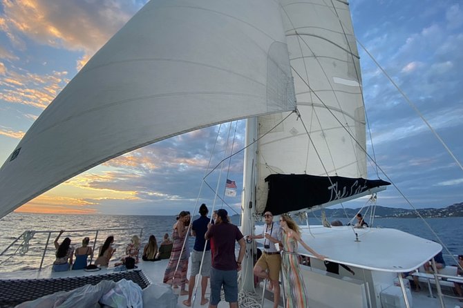 Sunset & Harbor Lights Dinner Sail from the Marriott's Frenchman's Cove - Open bar, music, and the onboard mood